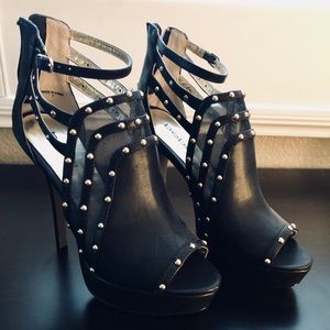 Black and gold studded Bebe heels